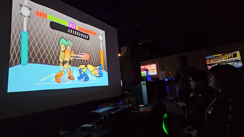 Players competing in Rhythm Fighter from Rhythm Heaven Fever, as documented in https://www.youtube.com/watch?v=XchdaSDQIs0.